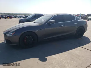2014 Maserati Ghibli S Q4 with VIN ZAM57RTA7E1085782, listed as a Copart auction lot 75537634 with 111,616 mi miles and Salvage Title. Bid and sale history available at carsss.com. Image 1.