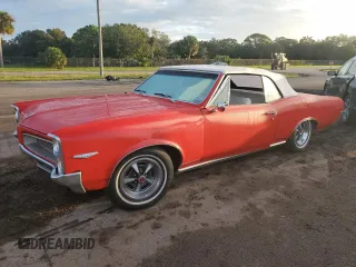 1966 Pontiac GTO z VIN 235676P261739, wystawiony jako Copart lot #75633424 z przebiegiem 23 103 mil mil oraz Szkoda całkowita • Salvage title. Historia ofert i sprzedaży dostępna na DreamBid. Obrazek 1.