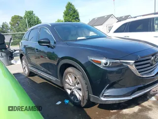 2021 Mazda CX-9 Carbon Edition with VIN JM3TCBDY3M0524241, listed as a IAAI auction lot 42538127 with 50,533 mi miles and . Bid and sale history available at DreamBid. Image 13.