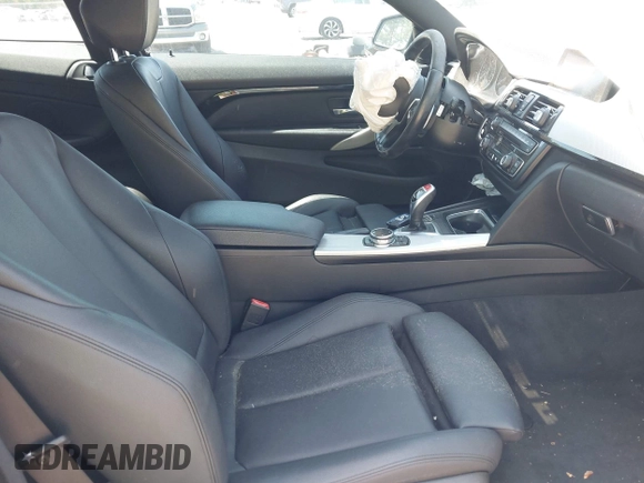 2014 BMW 4 Series 428i with VIN WBA3N7C50EK220438, listed as a IAAI auction lot 41990873 with 141,736 mi miles and . Bid and sale history available at carsss.com. Image 5.