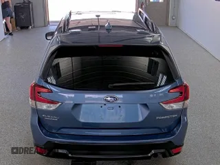 2021 Subaru Forester Premium z VIN JF2SKAJC9MH401167, wystawiony jako IAAI lot #42733865 z przebiegiem 85 994 mil mil oraz . Historia ofert i sprzedaży dostępna na DreamBid. Obrazek 1.