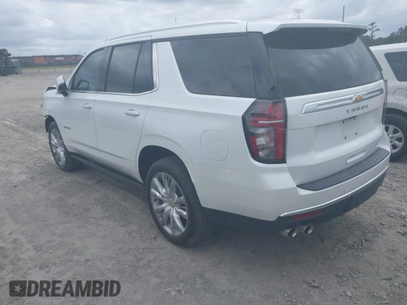 2023 Chevrolet Tahoe High Country z VIN 1GNSCTKL1PR544951, wystawiony jako IAAI lot #42113529 z przebiegiem 33 106 mil mil oraz . Historia ofert i sprzedaży dostępna na DreamBid. Obrazek 3.