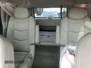 2015 Cadillac Escalade Premium z VIN 1GYS4NKJ5FR525280, wystawiony jako Copart lot #57763035 z przebiegiem Nie podano mil oraz Czysty tytuł • Clean title. Historia ofert i sprzedaży dostępna na DreamBid. Obrazek 10.