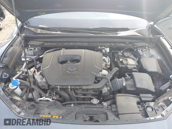 2023 Mazda CX-30 S Carbon Edition with VIN 3MVDMBCM8PM502891, listed as a IAAI auction lot 42050533 with 20,035 mi miles and . Bid and sale history available at DreamBid. Image 10.