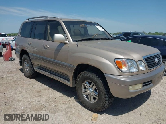 2001 Lexus LX 470 with VIN JTJHT00W613510736, listed as a IAAI auction lot 42005639 with 274,227 mi miles and . Bid and sale history available at carsss.com. Image 1.