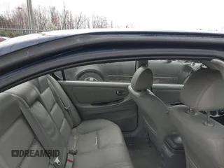 2003 Nissan Maxima GLE z VIN JN1DA31A03T412514, wystawiony jako IAAI lot #41856102 z przebiegiem 156 832 mil mil oraz . Historia ofert i sprzedaży dostępna na DreamBid. Obrazek 8.