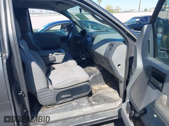 2004 Ford F-150 STX with VIN 1FTRX12W04NB32291, listed as a IAAI auction lot 42088596 with 233,491 mi miles. Bid and sale history available at carsss.com. Image 5.
