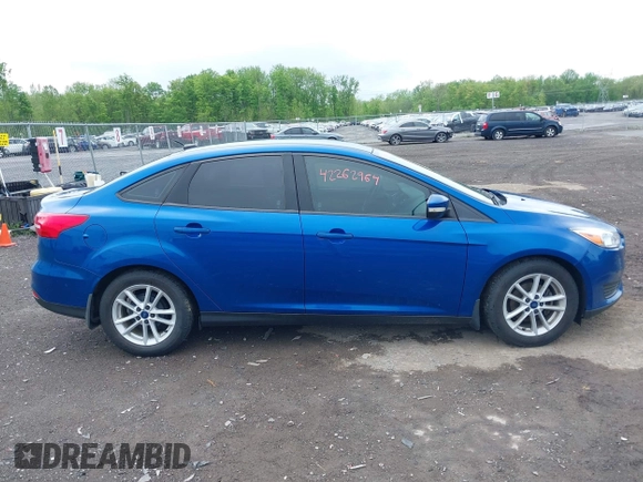 2018 Ford Focus SE z VIN 1FADP3F29JL235302, wystawiony jako IAAI lot #42262964 z przebiegiem 85 127 mil mil oraz . Historia ofert i sprzedaży dostępna na DreamBid. Obrazek 13.