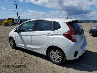 2015 Honda Fit LX with VIN 3HGGK5G55FM748175, listed as a Copart auction lot 56556915 with 98,858 mi miles and Salvage title. Bid and sale history available at DreamBid. Image 2.