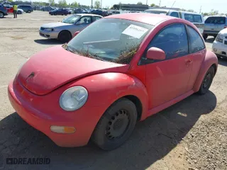 1998 Volkswagen New Beetle with VIN 3VWBB61C5WM032010, listed as a IAAI auction lot 41956207 with 206,776 mi miles. Bid and sale history available at carsss.com. Image 2.