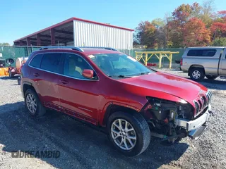 2016 Jeep Cherokee Latitude with VIN 1C4PJMCB2GW153972, listed as a IAAI auction lot 40579489 with 130,176 mi miles. Bid and sale history available at carsss.com. Image 1.