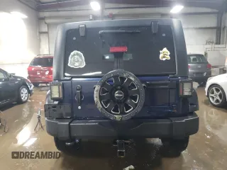 2013 Jeep Wrangler Unlimited Sport z VIN 1C4BJWDG5DL529707, wystawiony jako Copart lot #48436325 z przebiegiem 142 661 mil mil oraz Szkoda całkowita • Salvage title. Historia ofert i sprzedaży dostępna na DreamBid. Obrazek 6.