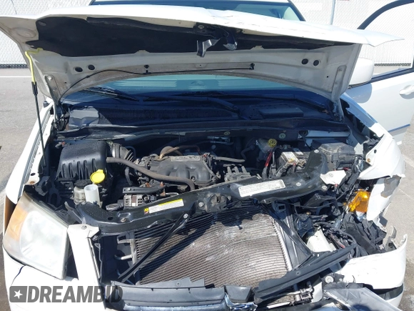2010 Dodge Grand Caravan SXT with VIN 2D4RN5D14AR420265, listed as a IAAI auction lot 41970366 with 117,208 mi miles and . Bid and sale history available at DreamBid. Image 10.