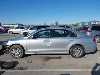 2014 Volkswagen Passat S w/Nav with VIN 1VWAP7A35EC052552, listed as a IAAI auction lot 41377109 with 123,273 mi miles. Bid and sale history available at carsss.com. Image 14.