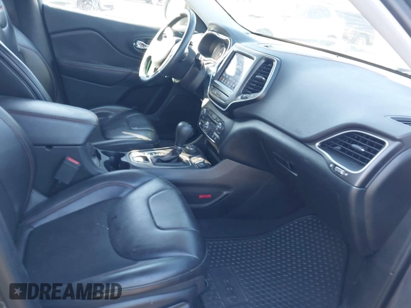 2019 Jeep Cherokee Trailhawk with VIN 1C4PJMBX6KD410391, listed as a IAAI auction lot 41821355 with 79,473 mi miles and . Bid and sale history available at DreamBid. Image 5.