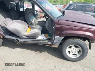 1998 Jeep Grand Cherokee Laredo с VIN 1J4GZ58S1WC103355, выставлен на аукционе IAAI как лот 42128472 с пробегом Не указан миль и . История ставок и продаж доступна на DreamBid. Изображение 13.