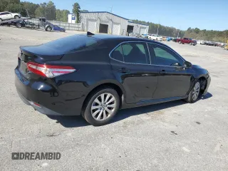 2020 Toyota Camry LE with VIN 4T1L11AK6LU999376, listed as a Copart auction lot 74192794 with 81,396 mi miles and Salvage Title. Bid and sale history available at carsss.com. Image 3.