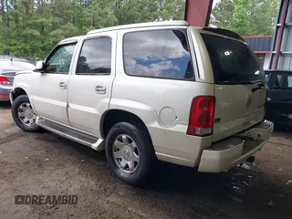 2003 Cadillac Escalade z VIN 1GYEK63NX3R241388, wystawiony jako IAAI lot #42227896 z przebiegiem 154 415 mil mil oraz . Historia ofert i sprzedaży dostępna na DreamBid. Obrazek 3.