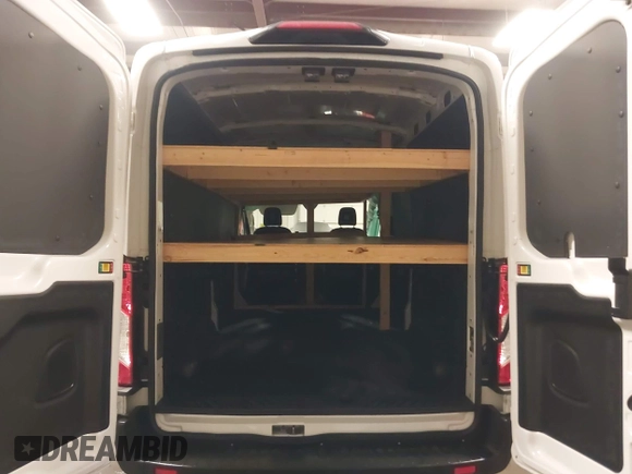 2024 Ford Transit Cargo with VIN 1FTBR2C81RKA01686, listed as a IAAI auction lot 41100566 with 74,842 mi miles and . Bid and sale history available at DreamBid. Image 17.