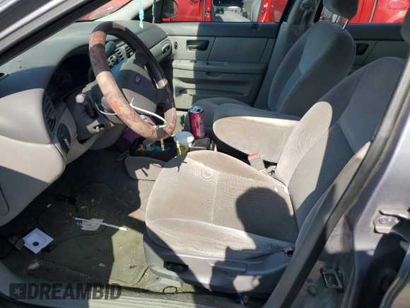 2006 Ford Taurus SE with VIN 1FAFP53U36A262525, listed as a Copart auction lot 86797374 with 179,508 mi miles and Salvage title. Bid and sale history available at DreamBid. Image 7.
