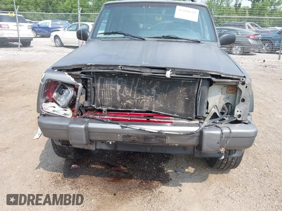 2000 Jeep Cherokee with VIN 1J4FF48S5YL159414, listed as a IAAI auction lot 42416639 with 177,932 mi miles and . Bid and sale history available at DreamBid. Image 13.