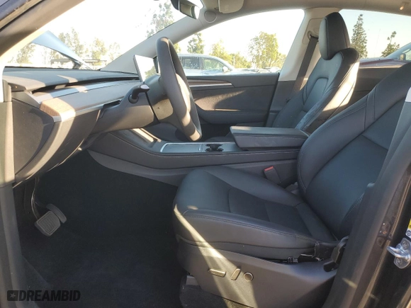 2024 Tesla Model Y with VIN 7SAYGDED2RF200414, listed as a Copart auction lot 88920875 with 2,420 mi miles and Salvage Title. Bid and sale history available at carsss.com. Image 7.