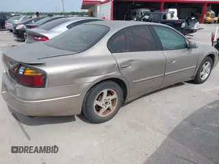 2004 Pontiac Bonneville SE z VIN 1G2HX52K04U248925, wystawiony jako IAAI lot #42072378 z przebiegiem 192 653 mil mil oraz . Historia ofert i sprzedaży dostępna na DreamBid. Obrazek 4.