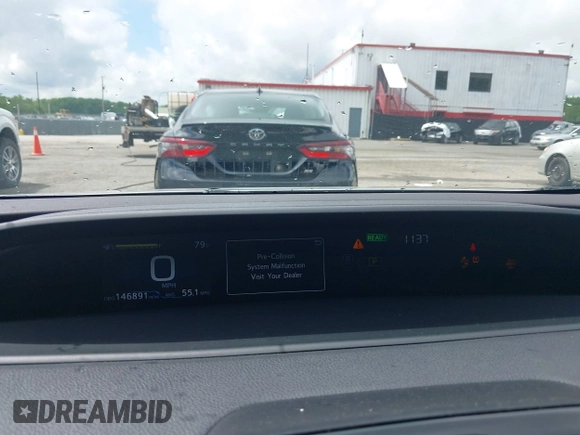 2022 Toyota Prius L Eco with VIN JTDKAMFU2N3161592, listed as a IAAI auction lot 42245464 with 146,891 mi miles and . Bid and sale history available at DreamBid. Image 7.