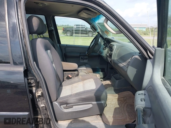 2005 Ford Explorer Sport Trac XLS z VIN 1FMZU67K15UA13387, wystawiony jako IAAI lot #42158317 z przebiegiem 170 703 mil mil oraz . Historia ofert i sprzedaży dostępna na DreamBid. Obrazek 5.