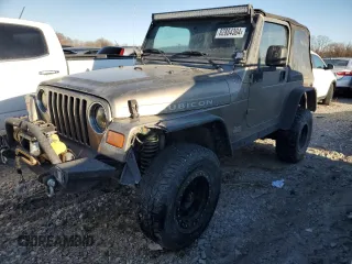 2004 Jeep Wrangler Rubicon with VIN 1J4FA69S94P778836, listed as a Copart auction lot 82884304 with 168,045 mi miles and Salvage Title. Bid and sale history available at carsss.com. Image 1.