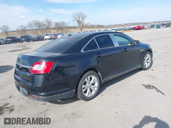 2011 Ford Taurus SEL with VIN 1FAHP2EW7BG139615, listed as a IAAI auction lot 41954932 with 256,223 mi miles. Bid and sale history available at carsss.com. Image 4.