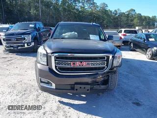 2015 GMC Yukon XL SLT with VIN 1GKS1HKC0FR675450, listed as a IAAI auction lot 41558343 with 187,814 mi miles. Bid and sale history available at carsss.com. Image 13.