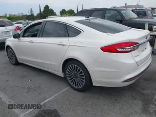 2017 Ford Fusion SE with VIN 3FA6P0HD0HR180188, listed as a IAAI auction lot 42146020 with 100,901 mi miles and . Bid and sale history available at DreamBid. Image 3.