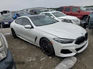 2022 BMW 8 Series M850i with VIN WBAGV8C03NCJ56725, listed as a Copart auction lot 66950784 with 26,359 mi miles and Salvage Title. Bid and sale history available at carsss.com. Image 4.