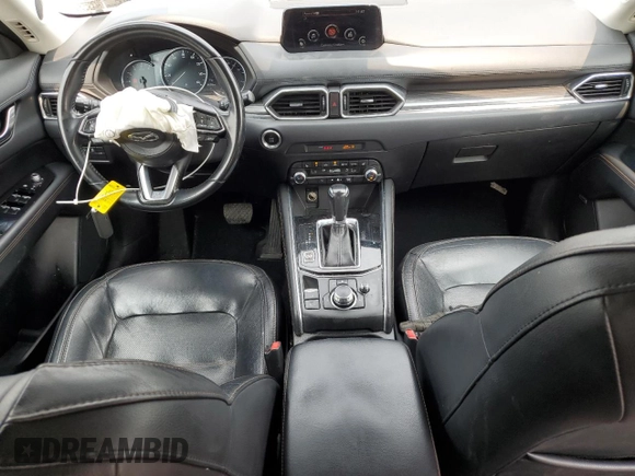 2019 Mazda CX-5 Grand Touring with VIN JM3KFBDM2K0569829, listed as a Copart auction lot 59060965 with 99,359 mi miles and Salvage title. Bid and sale history available at DreamBid. Image 8.