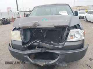 2006 Ford F-150 STX with VIN 1FTRX02WX6KB71470, listed as a IAAI auction lot 41402316 with 168,323 mi miles and . Bid and sale history available at DreamBid. Image 12.