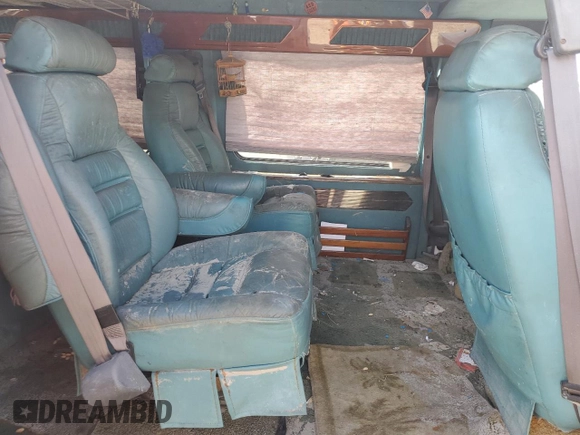 1999 Dodge Cargo Conversion z VIN 2B6HB11Y5XK521588, wystawiony jako Copart lot #75468904 z przebiegiem Nie podano mil oraz Nie do naprawy • Non repairable. Historia ofert i sprzedaży dostępna na DreamBid. Obrazek 11.