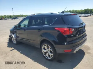 2019 Ford Escape Titanium с VIN 1FMCU9J91KUC57176, выставлен на аукционе Copart как лот 59131665 с пробегом Не указан миль и Списание • Salvage title. История ставок и продаж доступна на DreamBid. Изображение 2.