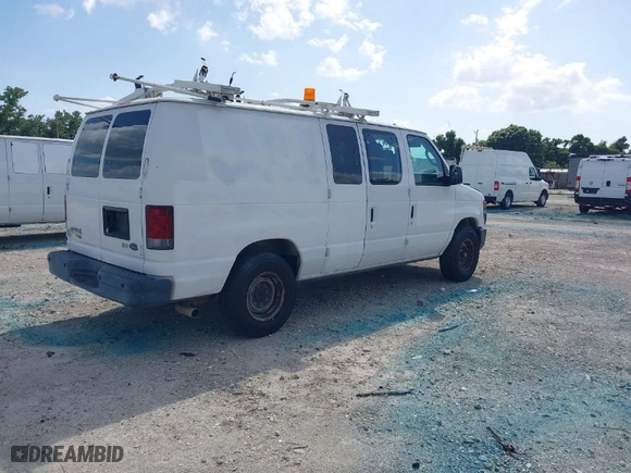 2011 Ford Econoline Cargo Van Commercial with VIN 1FTNE2EL0BDA70860, listed as a IAAI auction lot 41861425 with 205,107 mi miles. Bid and sale history available at carsss.com. Image 4.