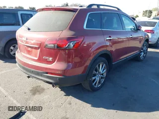 2014 Mazda CX-9 Grand Touring with VIN JM3TB3DV6E0435389, listed as a IAAI auction lot 41406200 with 181,598 mi miles and . Bid and sale history available at DreamBid. Image 4.