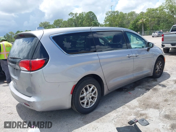 2017 Chrysler Pacifica Touring with VIN 2C4RC1DG7HR516711, listed as a IAAI auction lot 42633544 with 97,853 mi miles and . Bid and sale history available at DreamBid. Image 4.