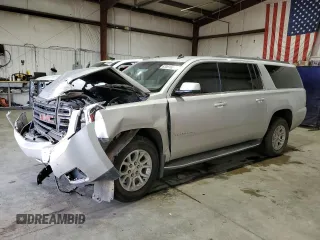 2015 GMC Yukon XL SLE with VIN 1GKS2GKC1FR121759, listed as a Copart auction lot 83361624 with 146,524 mi miles and Salvage Title. Bid and sale history available at carsss.com. Image 1.