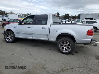 2002 Ford F-150 XLT with VIN 1FTRW07602KE38959, listed as a Copart auction lot 50547095 with 160,908 mi miles and Salvage Title. Bid and sale history available at carsss.com. Image 2.