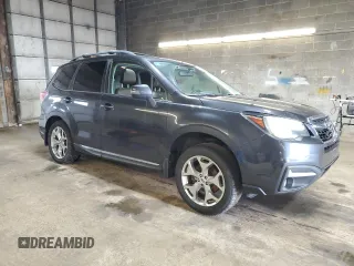2017 Subaru Forester Touring with VIN JF2SJAWC8HH540255, listed as a Copart auction lot 54015615 with 89,275 mi miles and Salvage Title. Bid and sale history available at DreamBid. Image 4.
