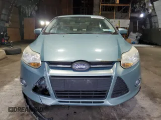 2012 Ford Focus SE with VIN 1FAHP3F27CL149328, listed as a Copart auction lot 56000325 with 147,097 mi miles and Salvage Title. Bid and sale history available at DreamBid. Image 5.