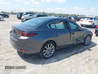 2023 Mazda 3 S Preferred with VIN 3MZBPACM8PM361196, listed as a IAAI auction lot 41940018 with 49,759 mi miles and . Bid and sale history available at DreamBid. Image 4.