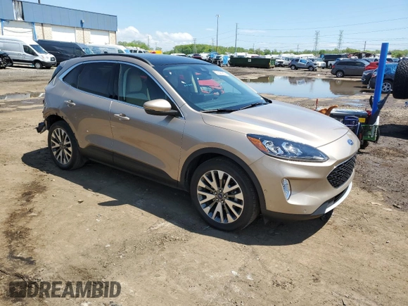2020 Ford Escape Titanium with VIN 1FMCU9J90LUA49890, listed as a Copart auction lot 57228065 with 24,283 mi miles and Salvage title. Bid and sale history available at DreamBid. Image 4.