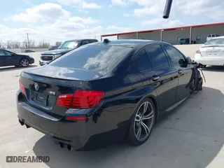 2013 BMW M5 with VIN WBSFV9C54DD095547, listed as a IAAI auction lot 41601733 with 1 mi miles. Bid and sale history available at carsss.com. Image 4.