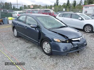 2007 Honda Civic with VIN JHMFA36267S031154, listed as a IAAI auction lot 42509552 with 223,575 mi miles and . Bid and sale history available at DreamBid. Image 1.