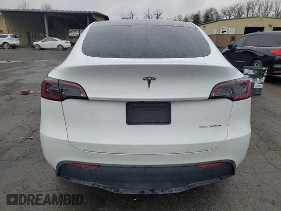 2023 Tesla Model Y Long Range with VIN 7SAYGDEEXPA122953, listed as a Copart auction lot 52627095 with Not Provided miles and Salvage Title. Bid and sale history available at DreamBid. Image 6.